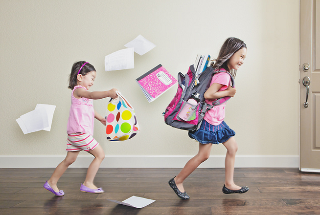 little-girls-with-backpack-playing