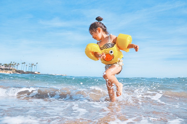 little-girl-rejoicing-summer-in-water