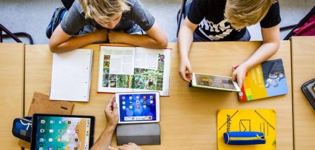 children-studying-using-tablet