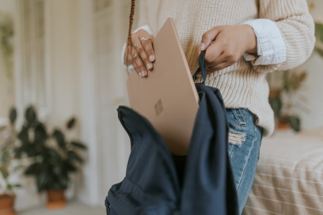 girl-holding-laptop